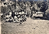 1957-rip-smdrovere-campo-arco-teso_taibon-riparto-con-don-ugo.jpg