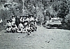 1957-rip-smdrovere-campo-arco-teso_taibon-7-riparto-con-don-ugo.jpg